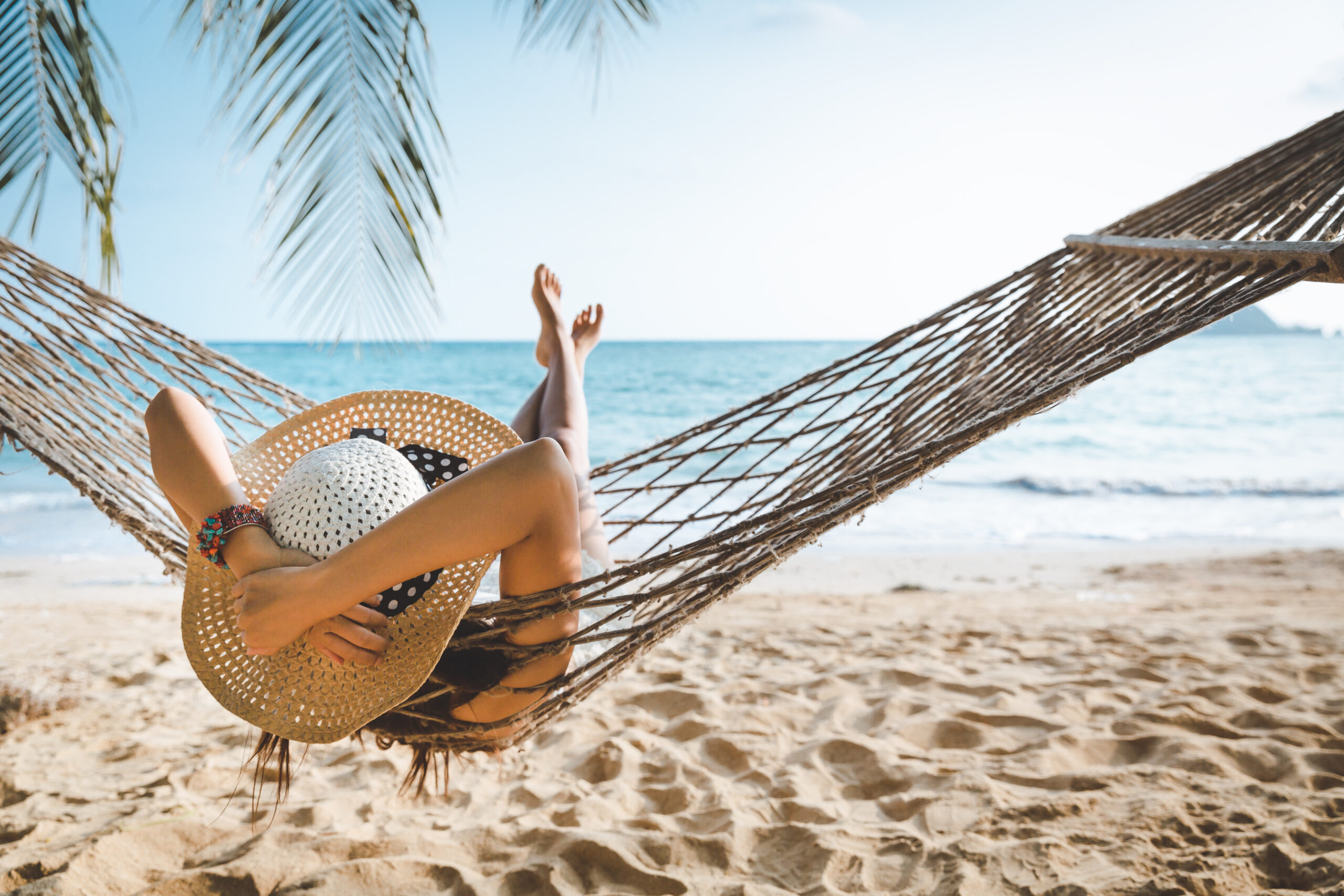 relaxed woman enjoying her vacation on the beach